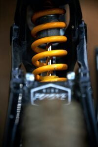 Damper and yellow spring